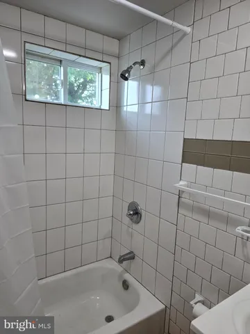 a bathroom with a bathtub