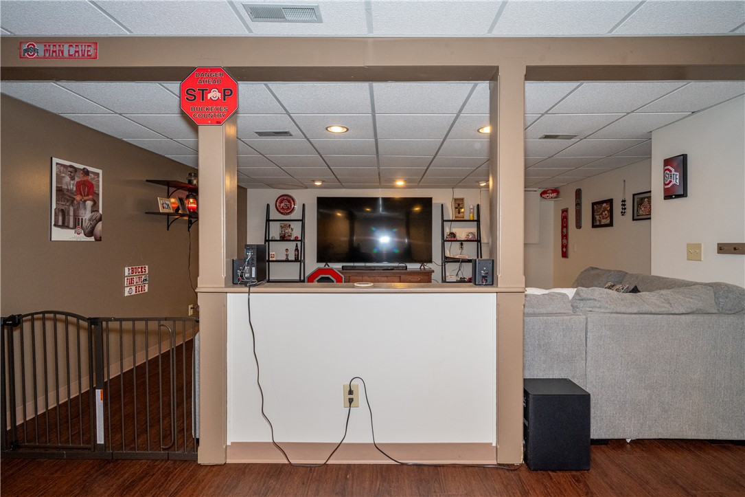 3628 Petre Road Springfield, OH 45502 - Photo 30 of 52 This finished basement offers an inviting entertainment space, ideal for leisure and gatherings.