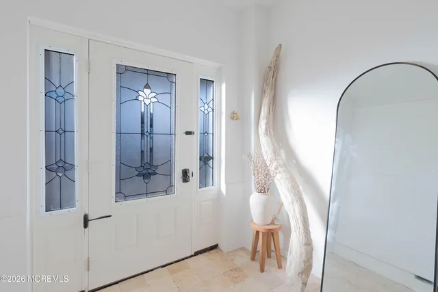 a view of an entryway with staircase