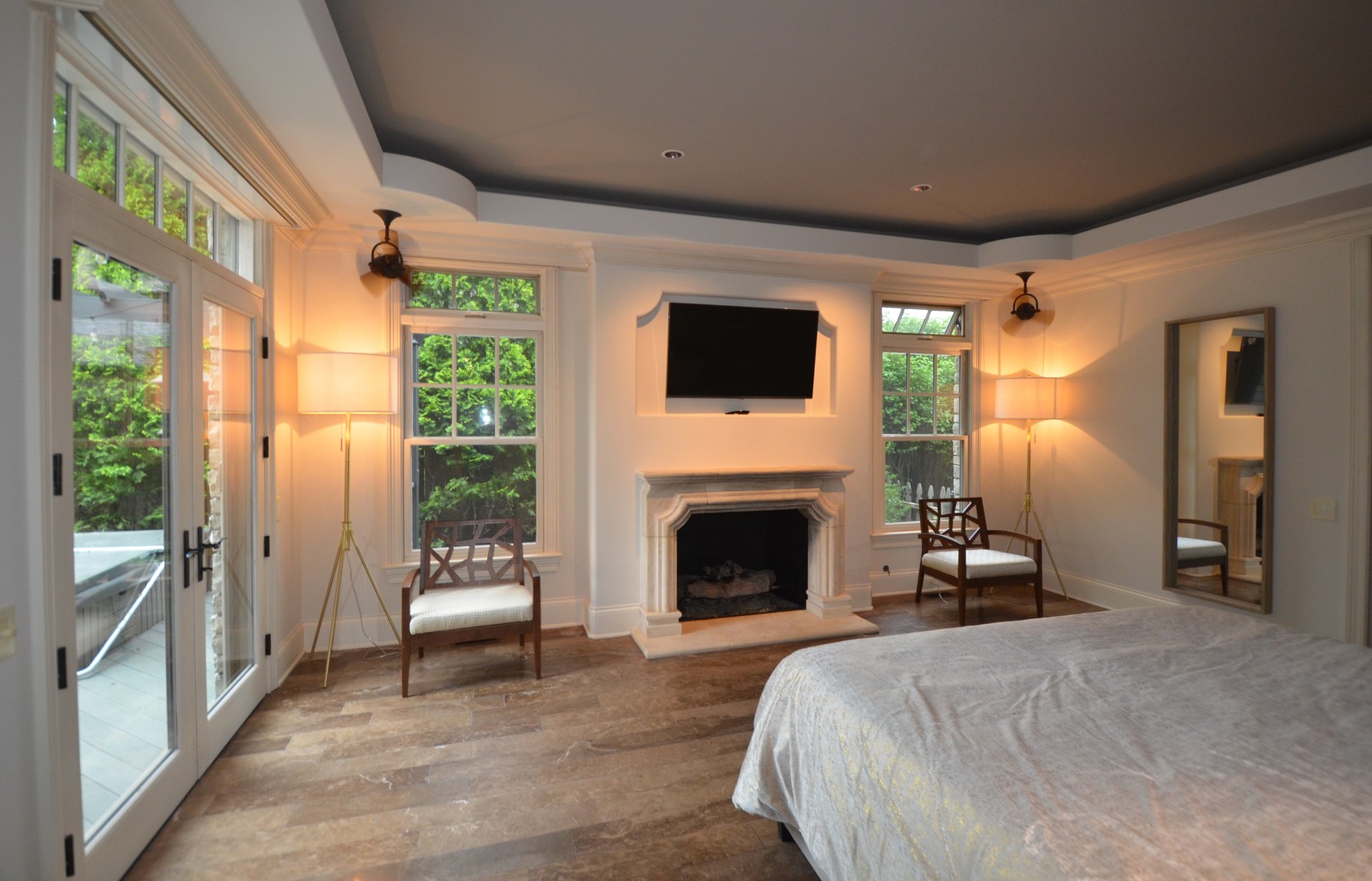 1230 Heather Lane Glenview, IL 60025 - Photo 14 of 38 a spacious bedroom with a bed and a fireplace
