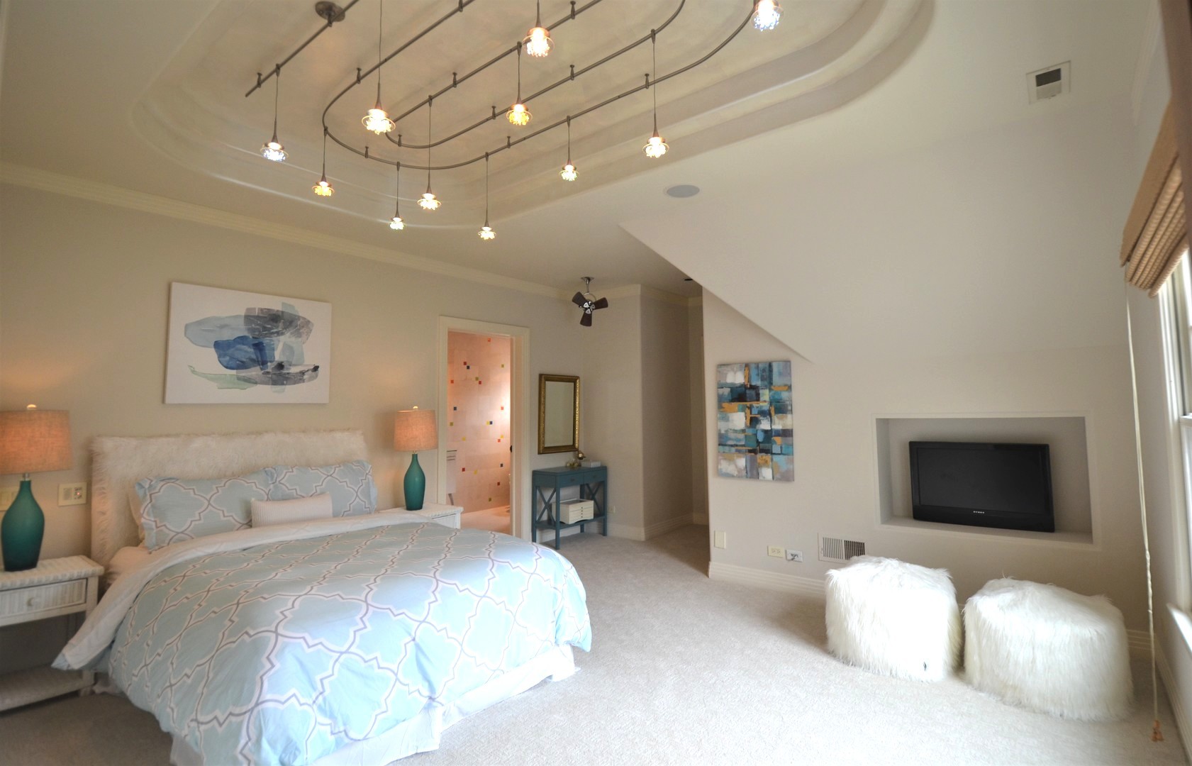 1230 Heather Lane Glenview, IL 60025 - Photo 16 of 38 a spacious bedroom with a bed and a television