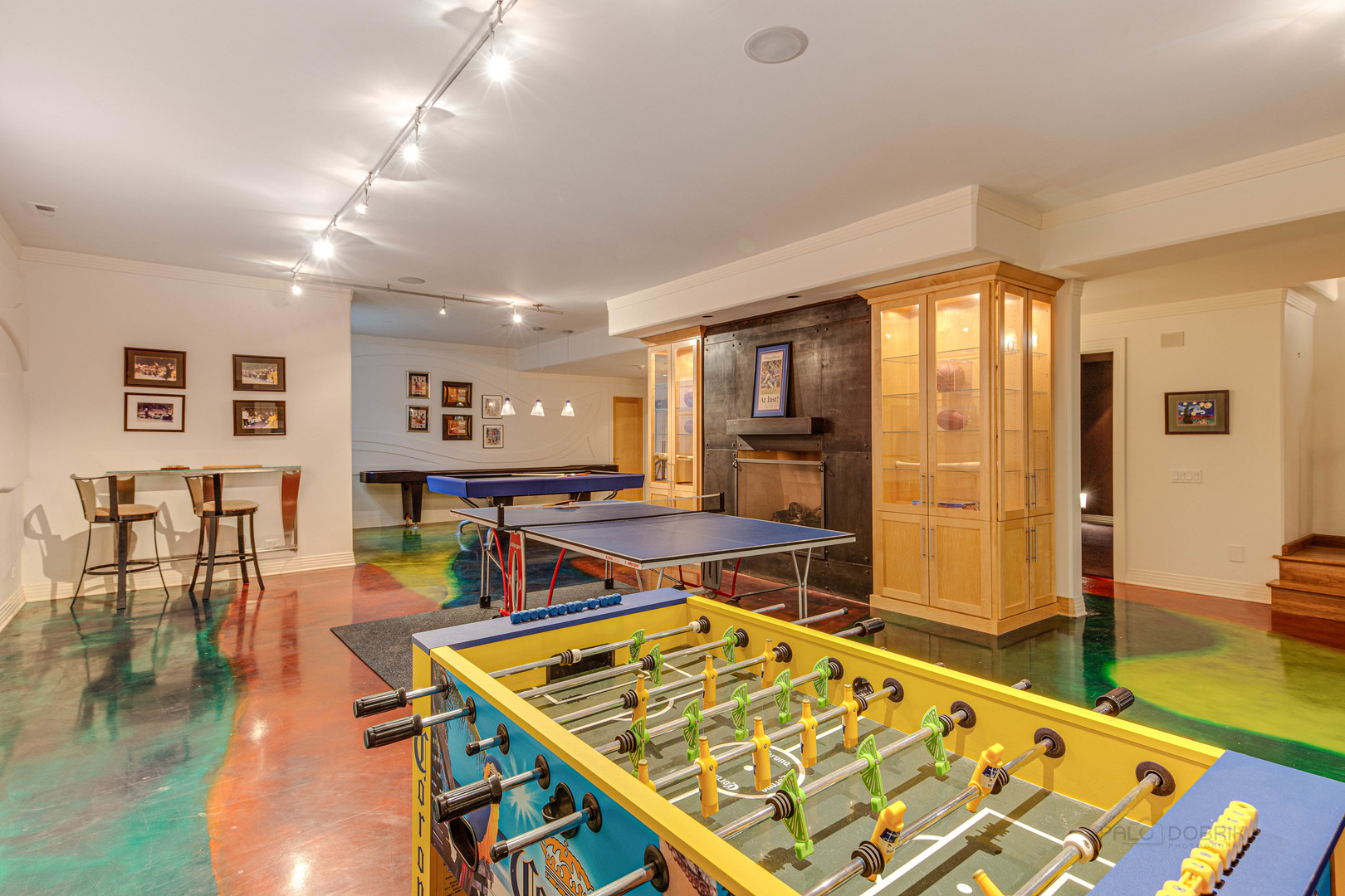 1230 Heather Lane Glenview, IL 60025 - Photo 25 of 38 a living room with dining table a table and chairs in it