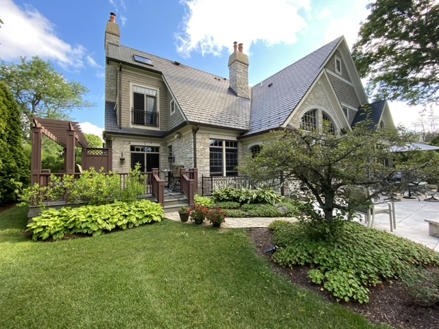 1230 Heather Lane Glenview, IL 60025 - Photo 36 of 38 a front view of a house with a yard