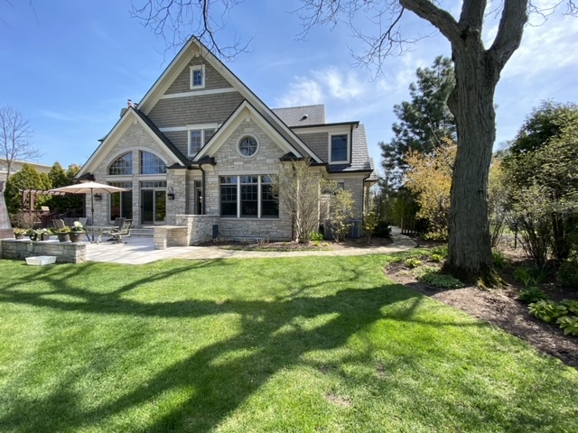 1230 Heather Lane Glenview, IL 60025 - Photo 37 of 38 a front view of a house with a yard