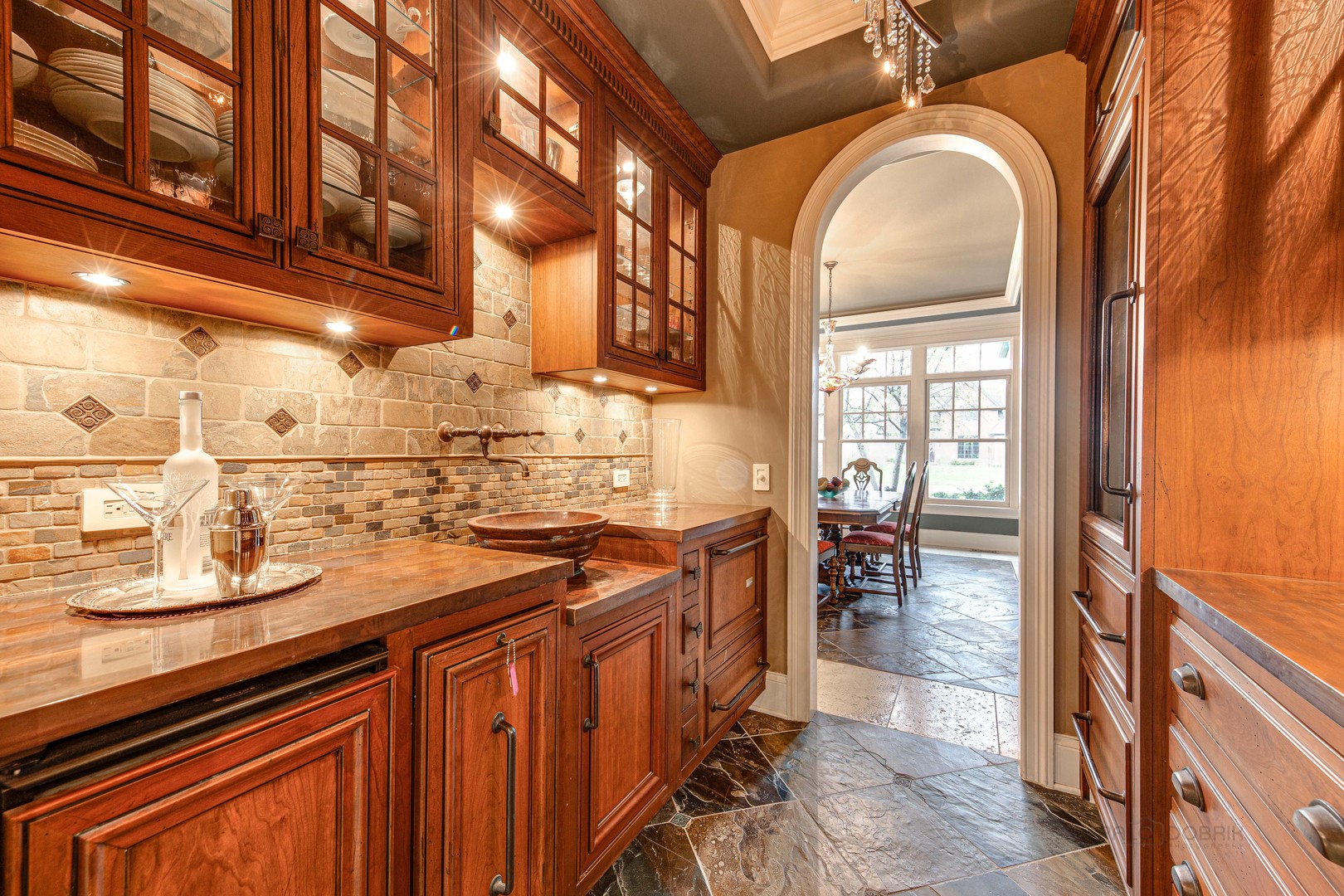 1230 Heather Lane Glenview, IL 60025 - Photo 4 of 38 a kitchen with stainless steel appliances granite countertop a sink and cabinets
