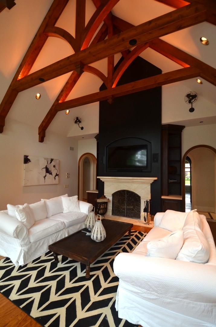 1230 Heather Lane Glenview, IL 60025 - Photo 5 of 38 a bedroom with a bed and a fireplace