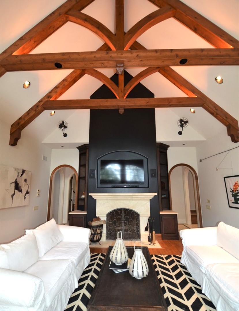 1230 Heather Lane Glenview, IL 60025 - Photo 7 of 38 a living room with furniture and a fireplace