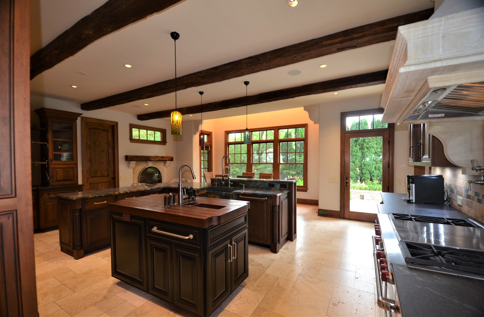 1230 Heather Lane Glenview, IL 60025 - Photo 9 of 38 a kitchen with stainless steel appliances granite countertop a stove a sink and a refrigerator