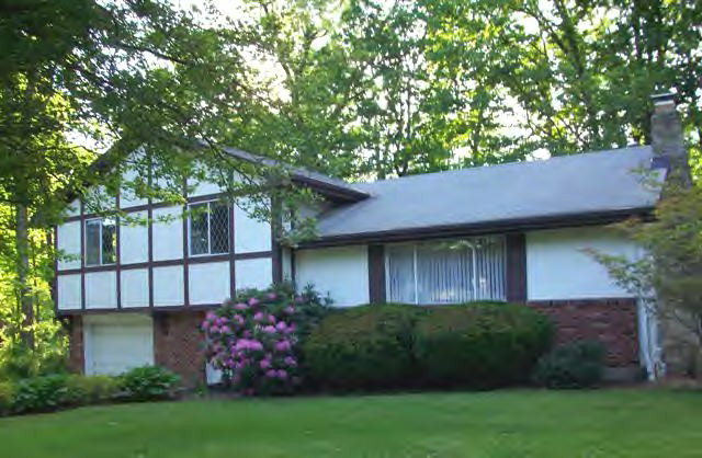 23 Paul Revere Road Oil City, PA 16301 - Photo 1 of 1 a house view with a garden space