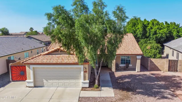 a front view of a house with garage