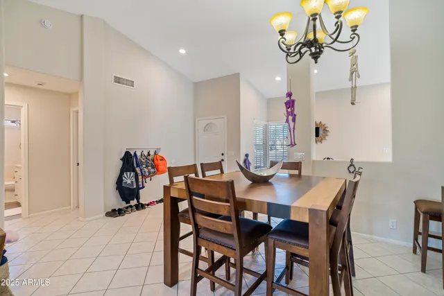 a kitchen with stainless steel appliances granite countertop a sink and a stove
