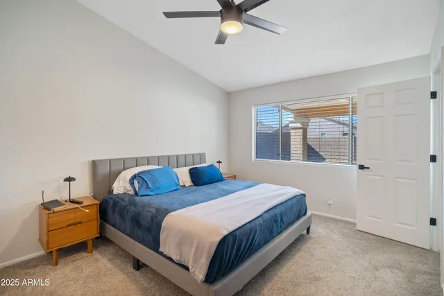 a bedroom with a bed and a cabinets