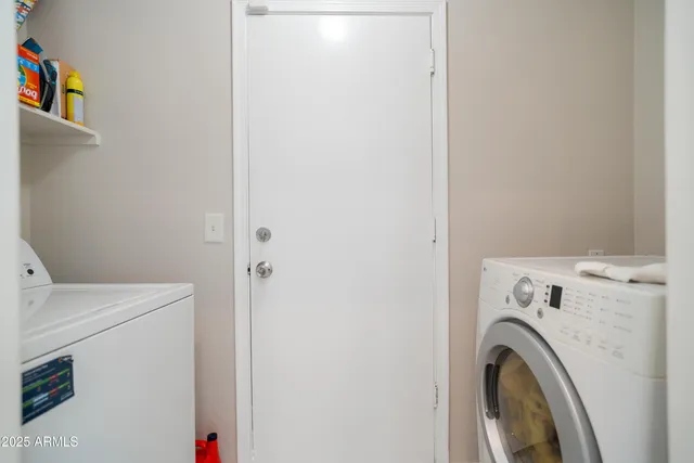 a bathroom with a sink a vanity and a mirror