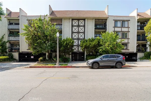 a car parked in front of a building