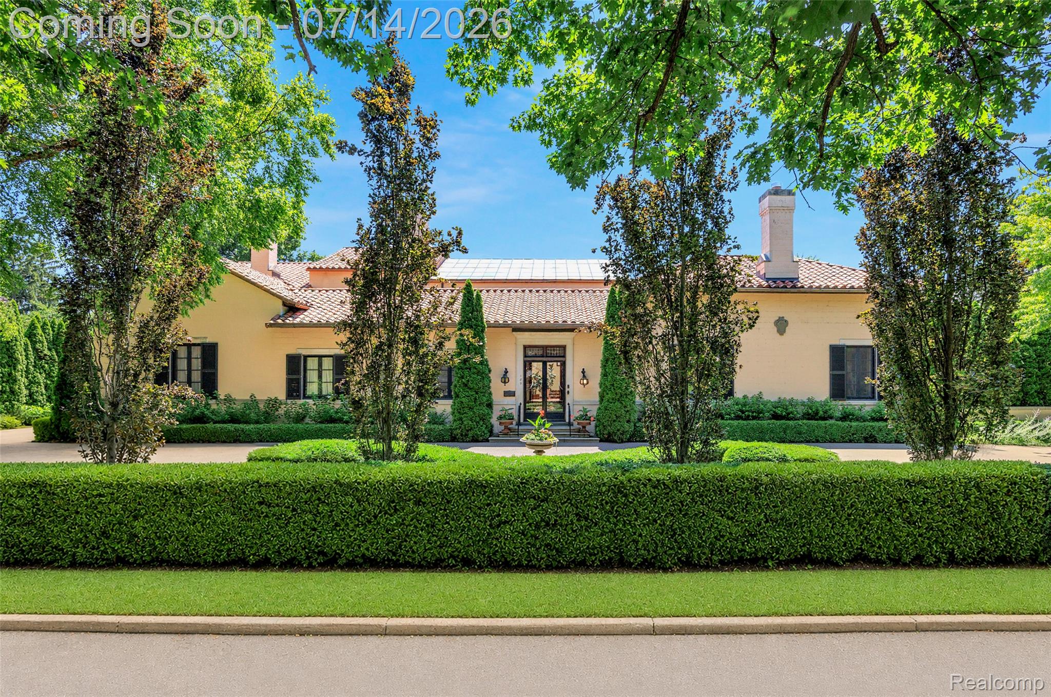 189 Cloverly Road Grosse Pointe, MI 48236 - Photo 1 of 96 Mediterranean-style residence featuring a terracotta tile roof, stucco exterior, and black louvered shutters