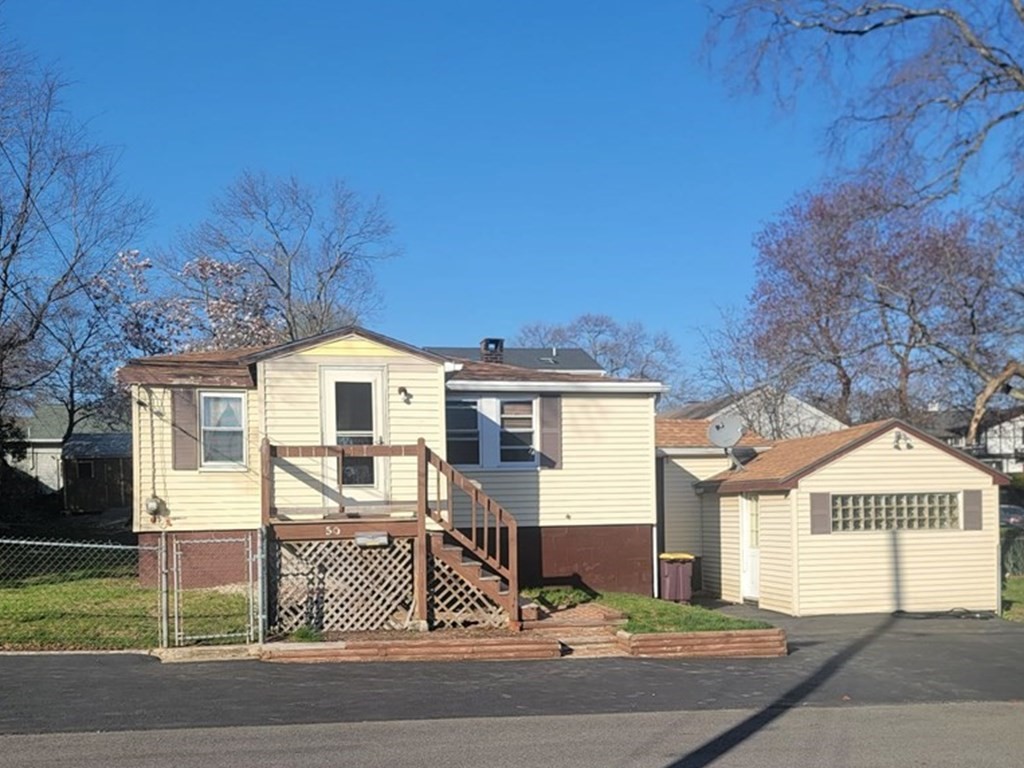 50 Pine Ridge Road Weymouth, MA 02189 - Photo 1 of 20 a front view of a house with a yard