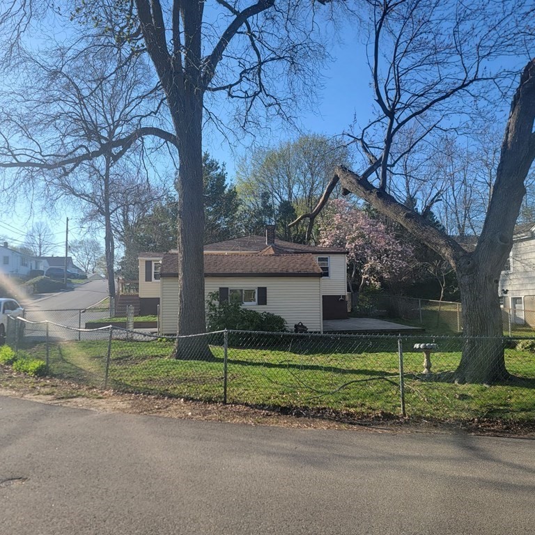 50 Pine Ridge Road Weymouth, MA 02189 - Photo 3 of 20 a front view of a house with a yard and large trees