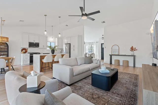 a front view of house with a garden