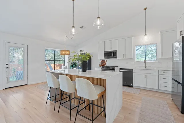 a view of backyard with green space