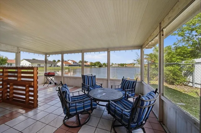 a view of a terrace with furniture and outdoor space