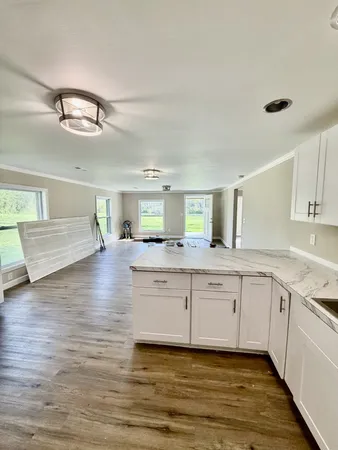 a spacious bathroom with a double vanity sink and a mirror