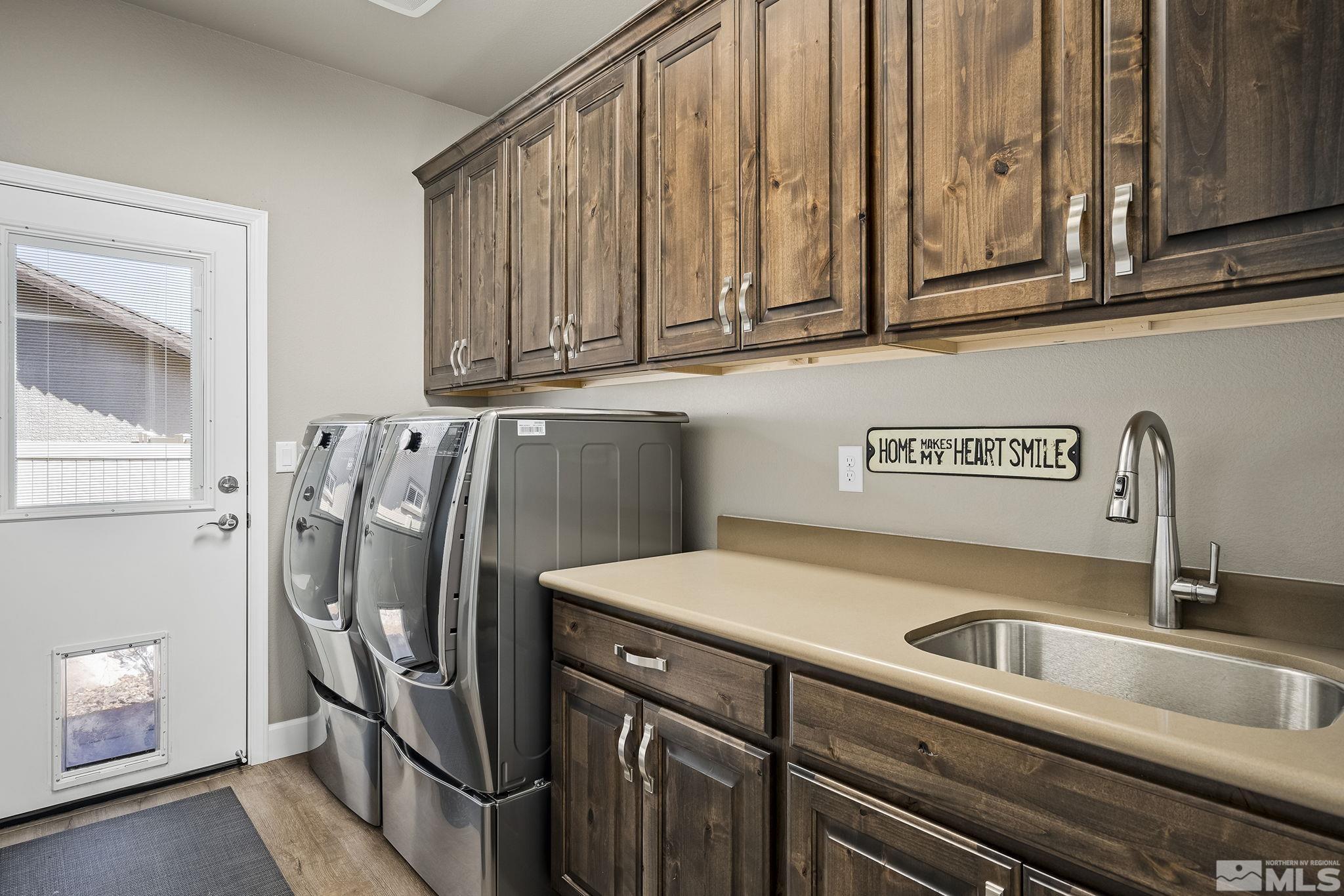 2173 Berkich Court Reno, NV 89521 - Photo 15 of 29 a view of a sink and washer dryer