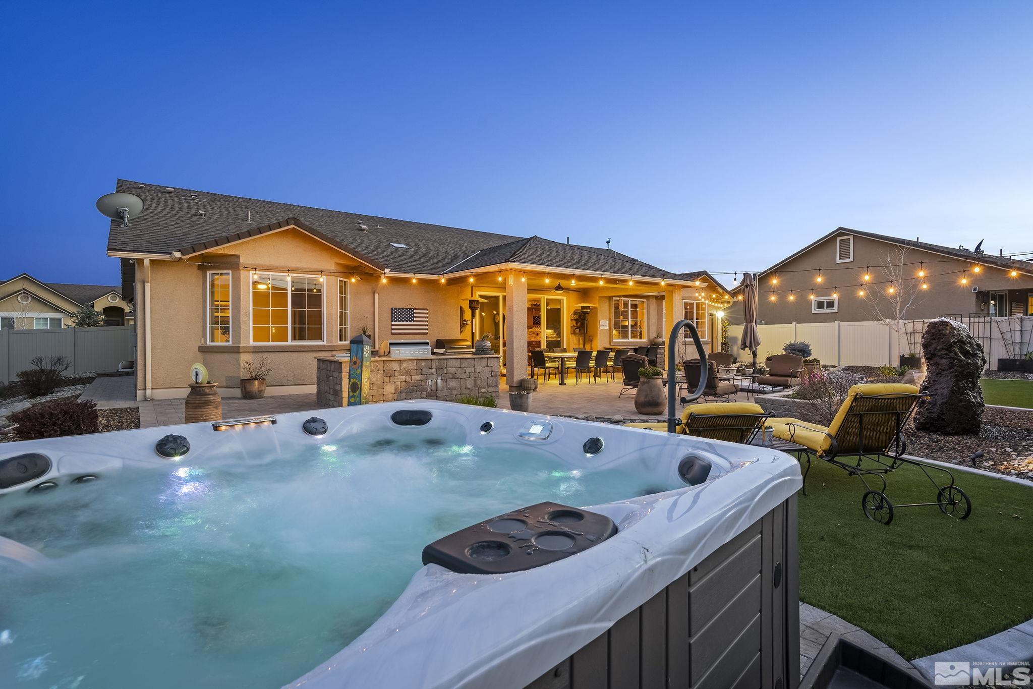 2173 Berkich Court Reno, NV 89521 - Photo 23 of 29 a view of a house with swimming pool and porch