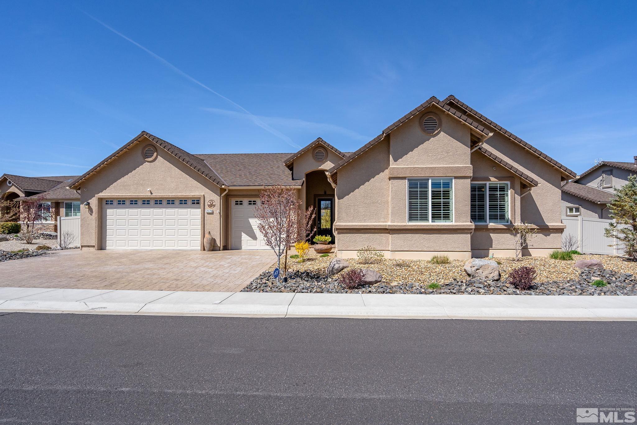 2173 Berkich Court Reno, NV 89521 - Photo 29 of 29 a front view of a house with a yard