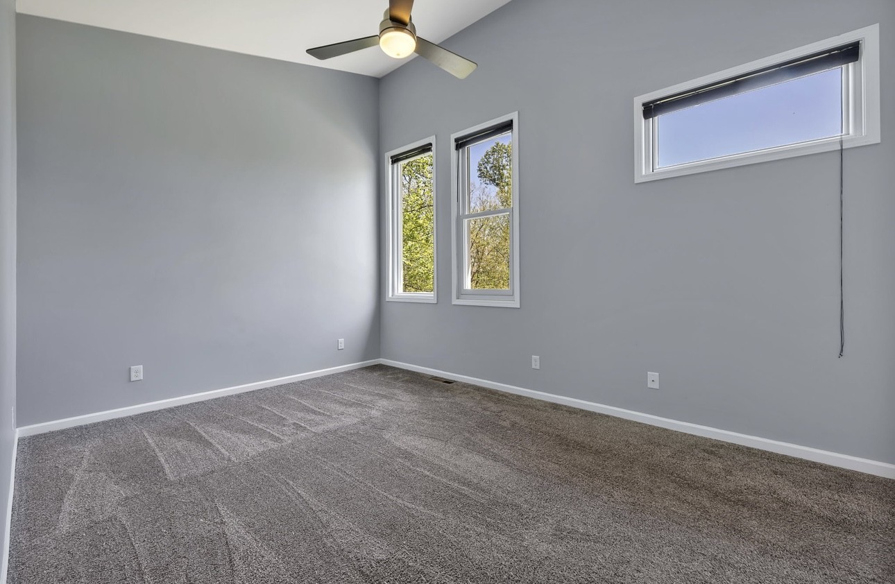 1104 Deer Ridge Road Kingston Springs, TN 37082 - Photo 11 of 36 a view of an empty room with a window