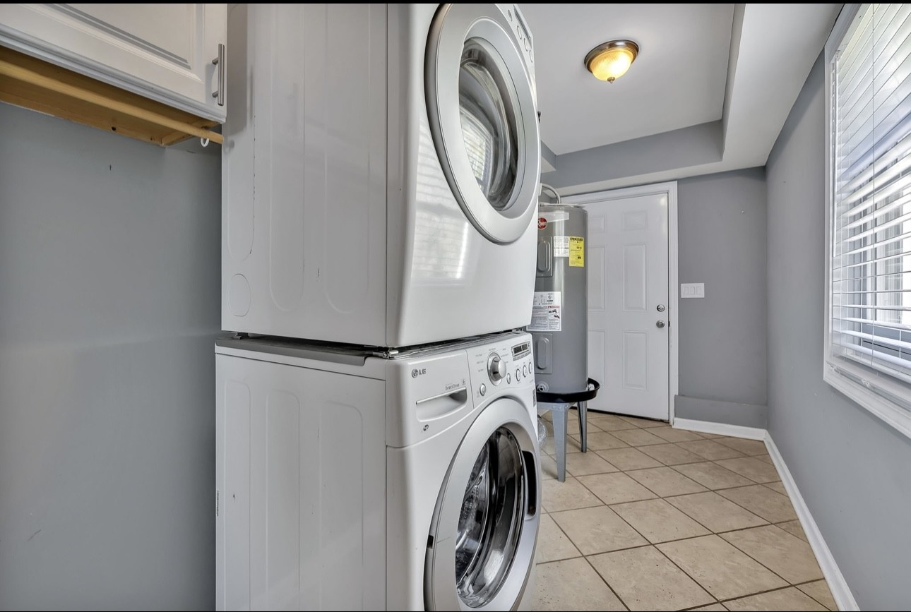 1104 Deer Ridge Road Kingston Springs, TN 37082 - Photo 21 of 36 a utility room with dryer and washer