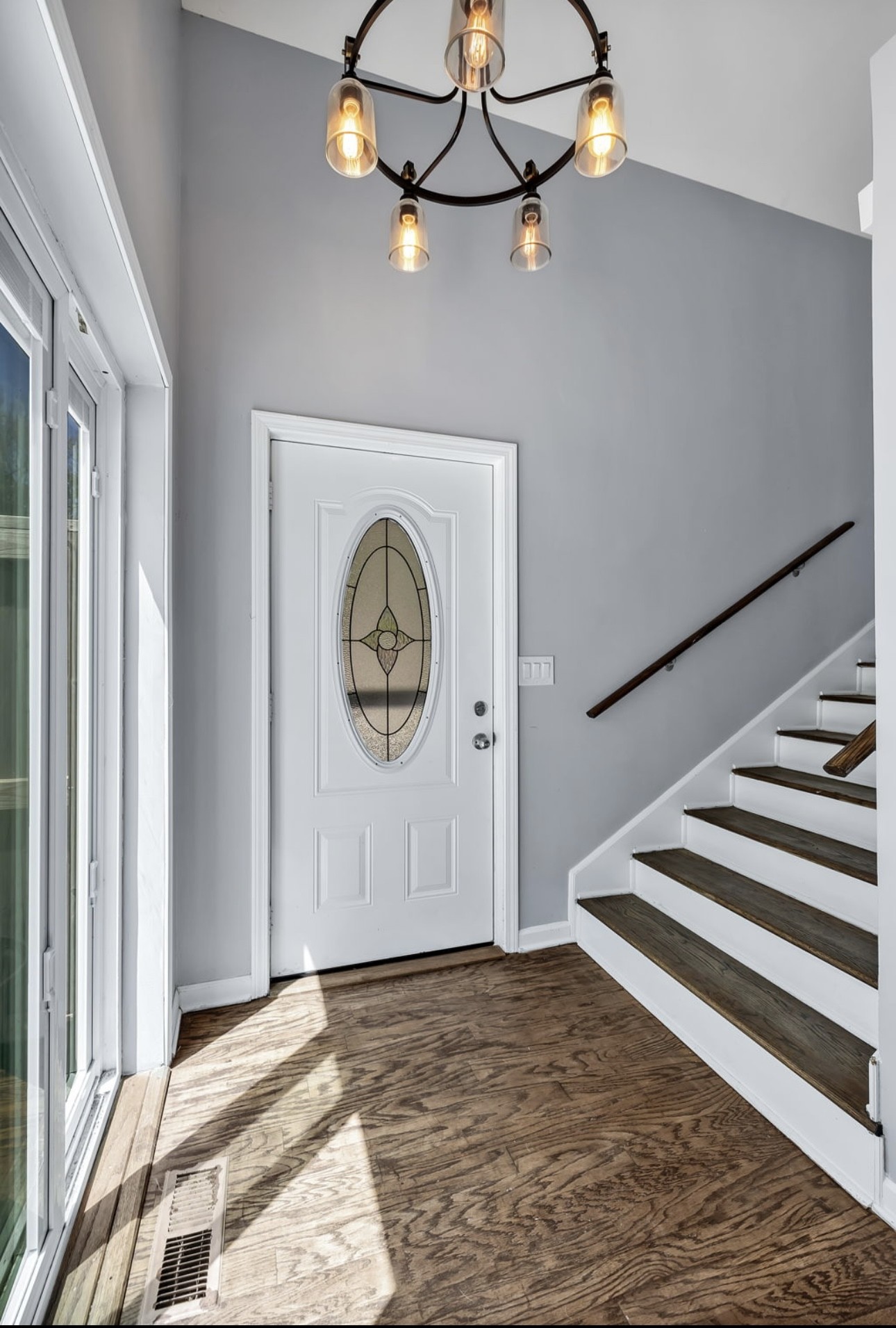 1104 Deer Ridge Road Kingston Springs, TN 37082 - Photo 3 of 36 a view of a hallway with wooden floor and workspace