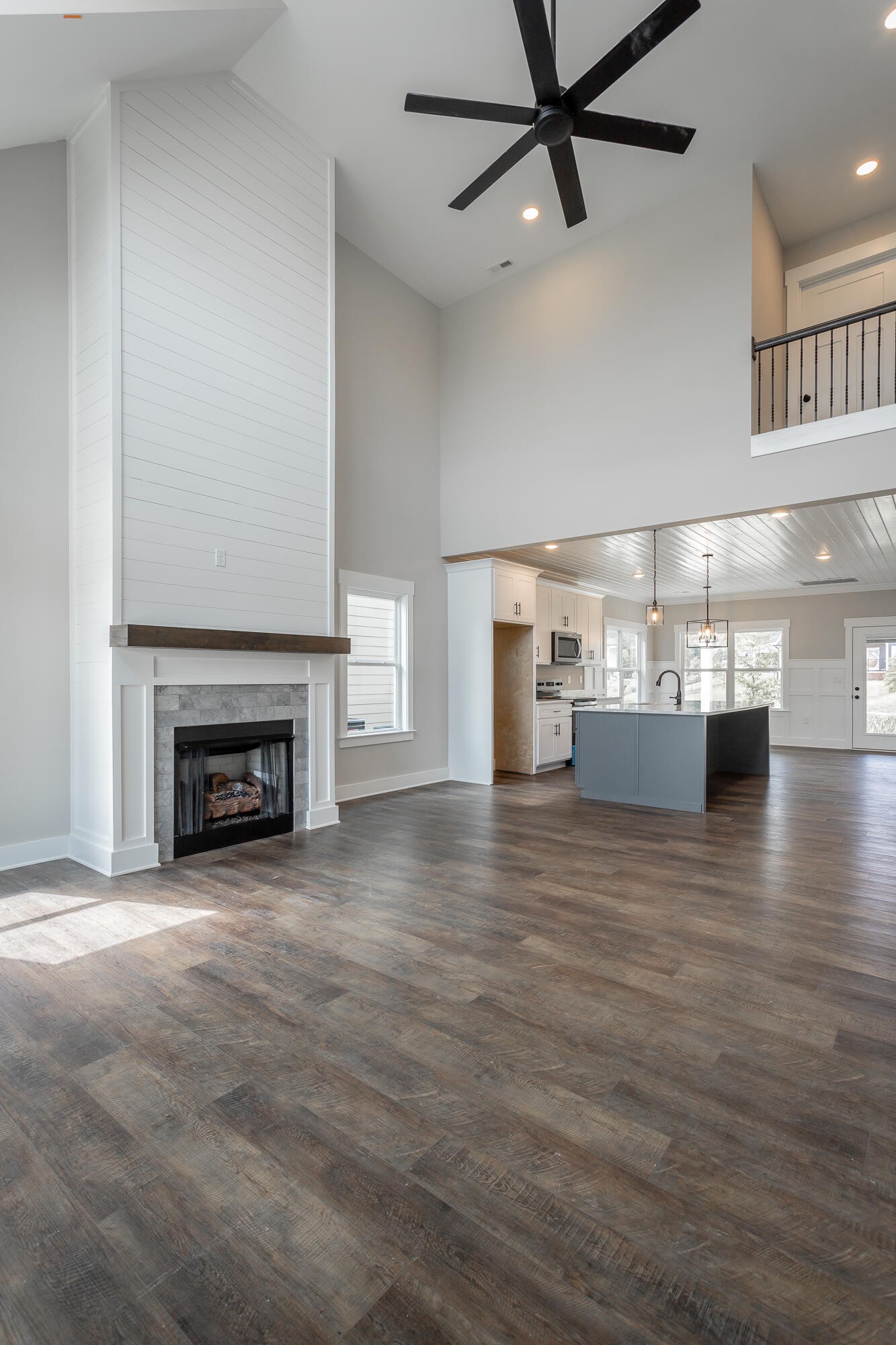 364 Willow Grv Court, Unit 67 Ringgold, GA 30736 - Photo 15 of 78 a view of a room with wooden floor fireplace and windows