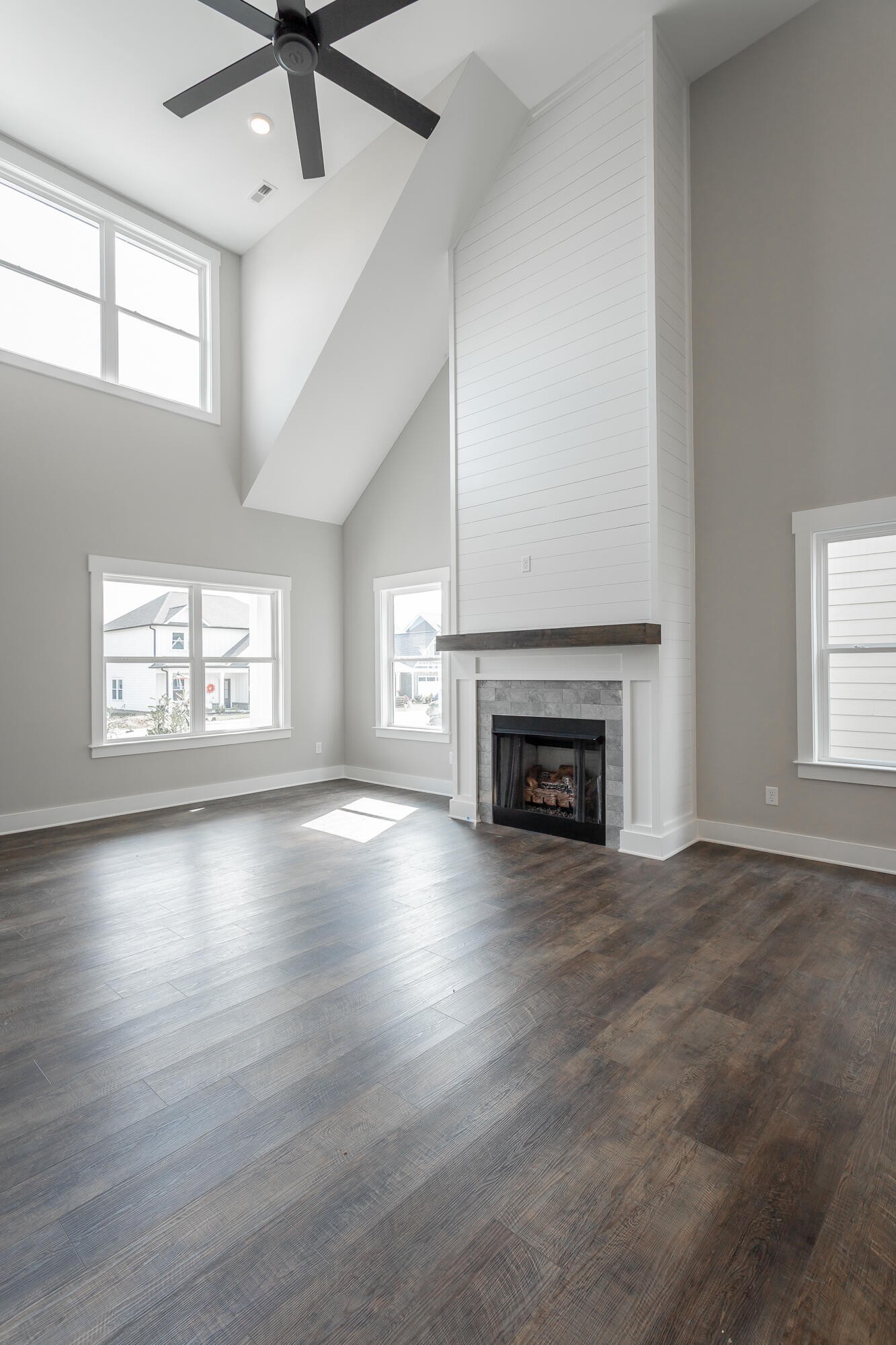 364 Willow Grv Court, Unit 67 Ringgold, GA 30736 - Photo 20 of 78 an empty room with windows fireplace and windows