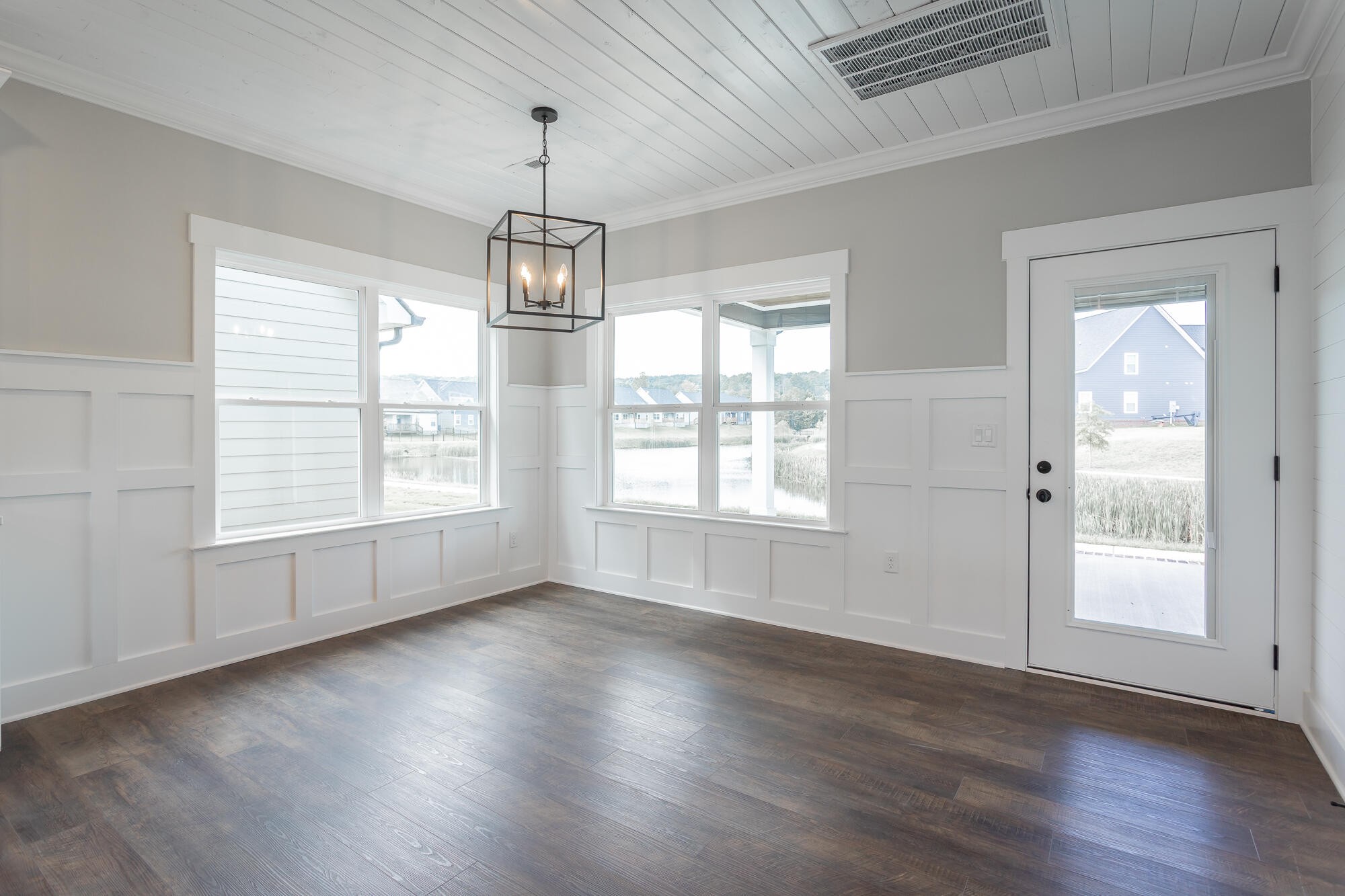 364 Willow Grv Court, Unit 67 Ringgold, GA 30736 - Photo 34 of 78 an empty room with wooden floor and windows