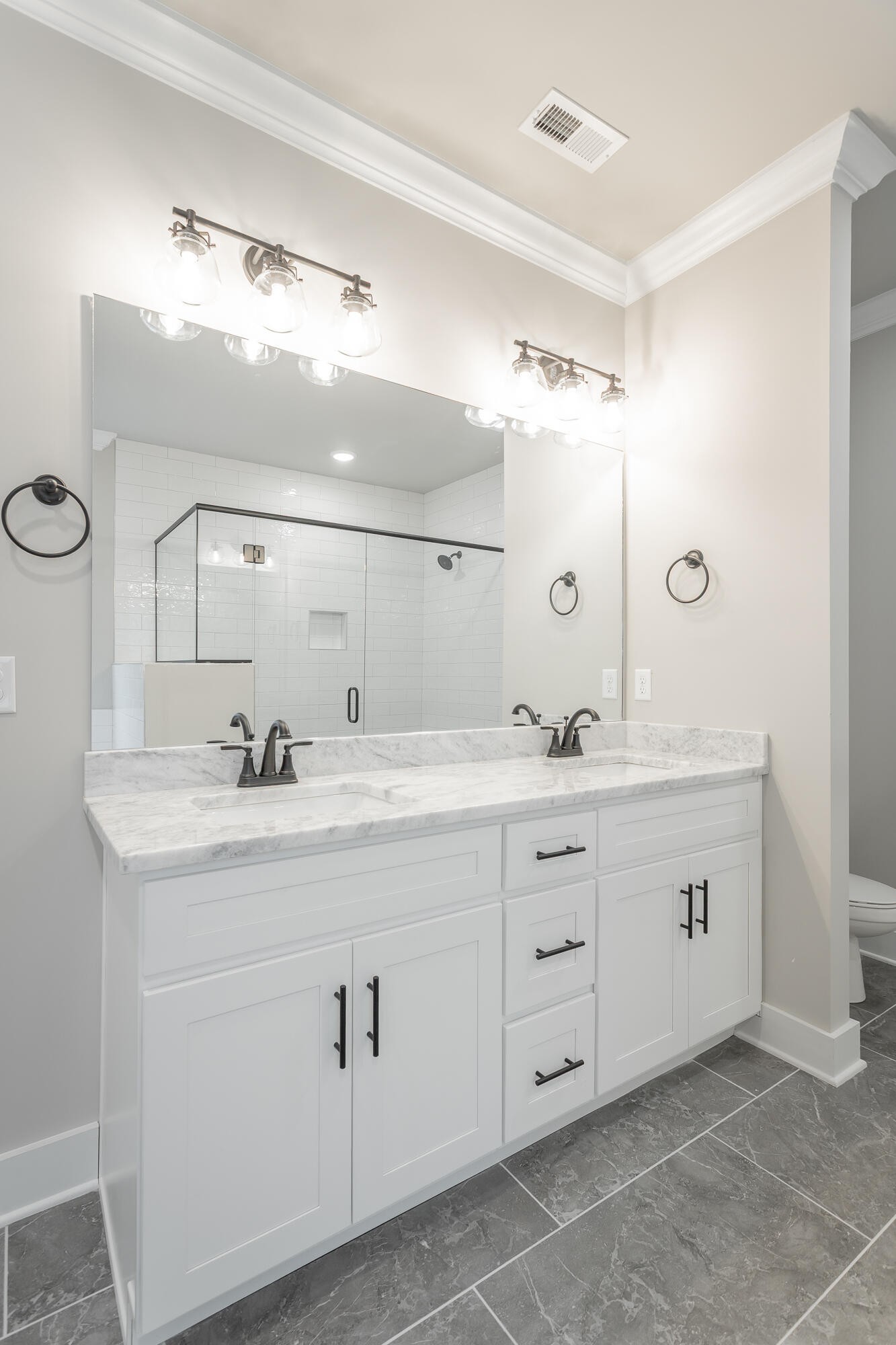 364 Willow Grv Court, Unit 67 Ringgold, GA 30736 - Photo 48 of 78 a bathroom with a granite countertop sink a mirror and a
