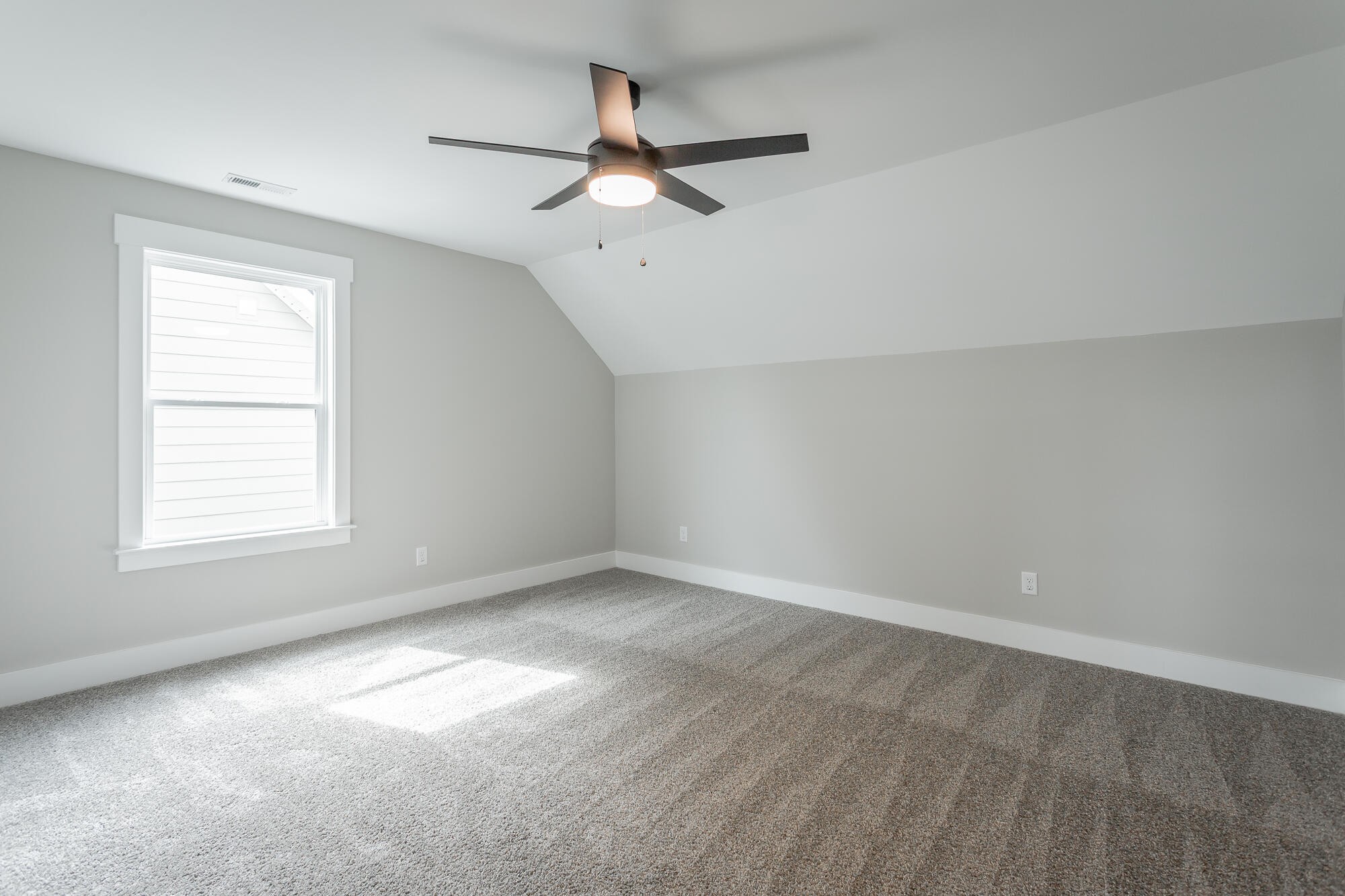 364 Willow Grv Court, Unit 67 Ringgold, GA 30736 - Photo 59 of 78 an empty room with a window and a fan