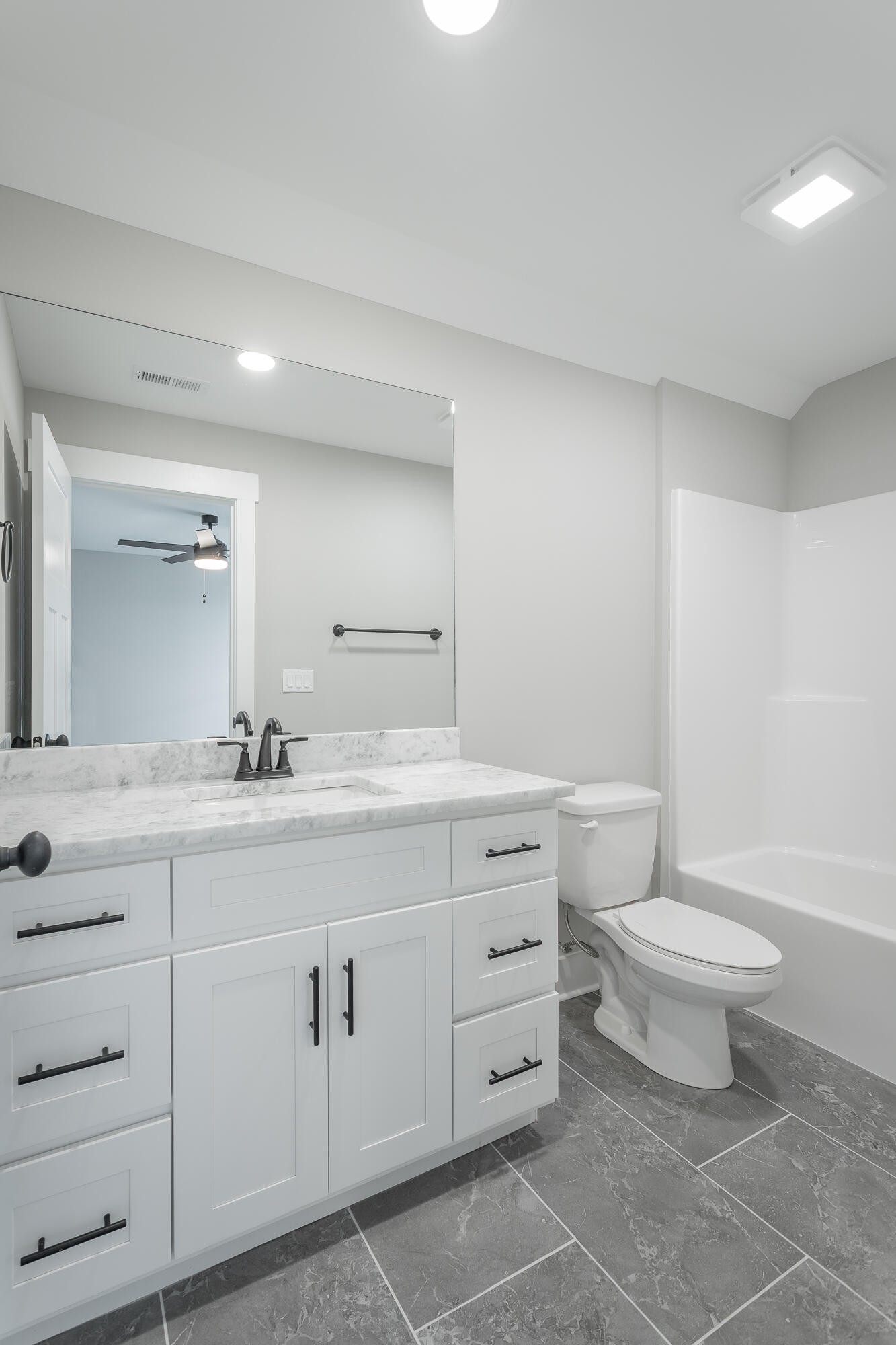 364 Willow Grv Court, Unit 67 Ringgold, GA 30736 - Photo 65 of 78 a bathroom with a double vanity sink toilet and a mirror