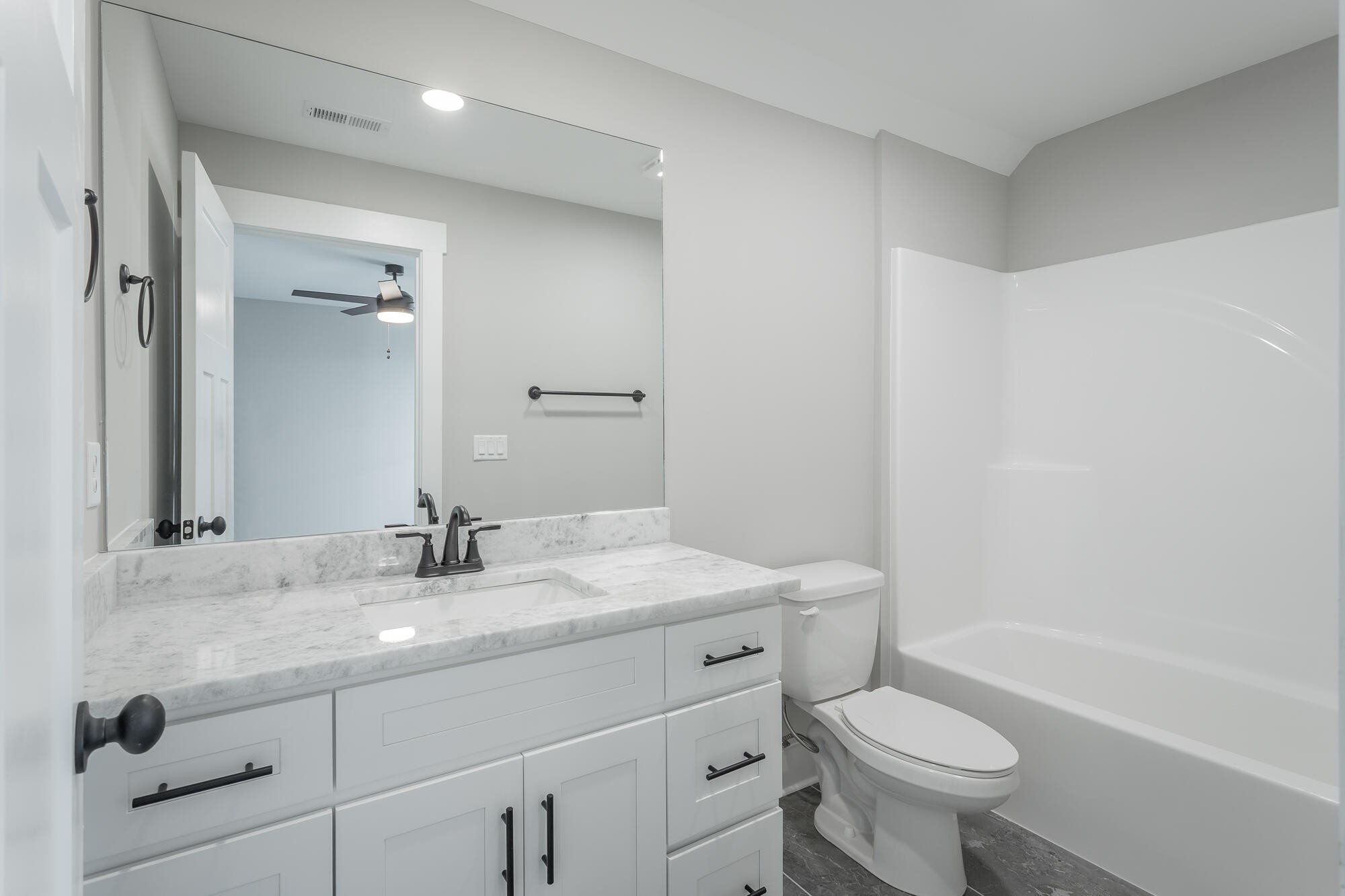 364 Willow Grv Court, Unit 67 Ringgold, GA 30736 - Photo 66 of 78 a bathroom with a sink a toilet and shower