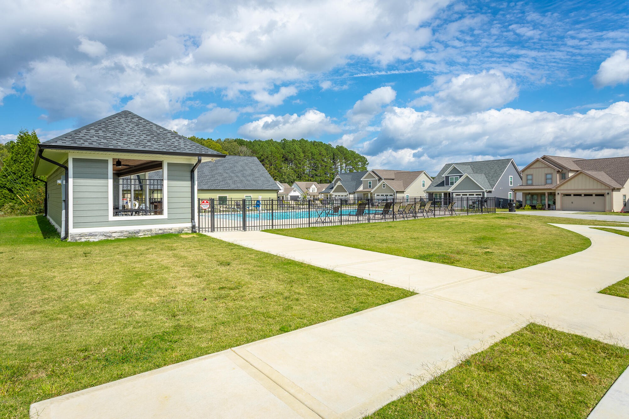 364 Willow Grv Court, Unit 67 Ringgold, GA 30736 - Photo 75 of 78 a view of a house with swimming pool and a yard