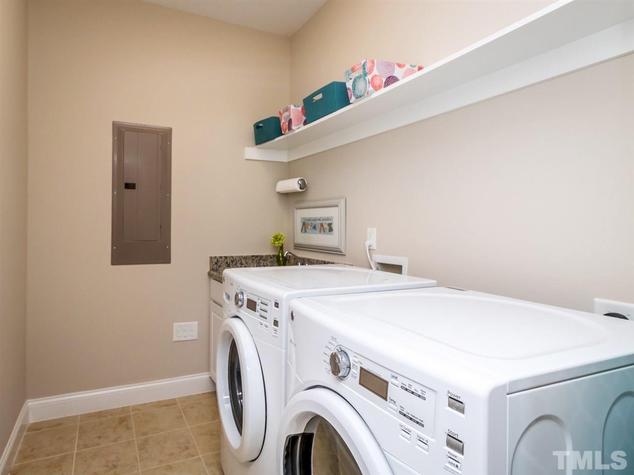 1589 Fullerton Place Raleigh, NC 27607 - Photo 13 of 25 a utility room with dryer and washer