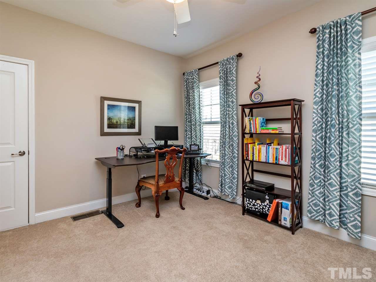 1589 Fullerton Place Raleigh, NC 27607 - Photo 20 of 25 a view of a workspace with furniture and a window