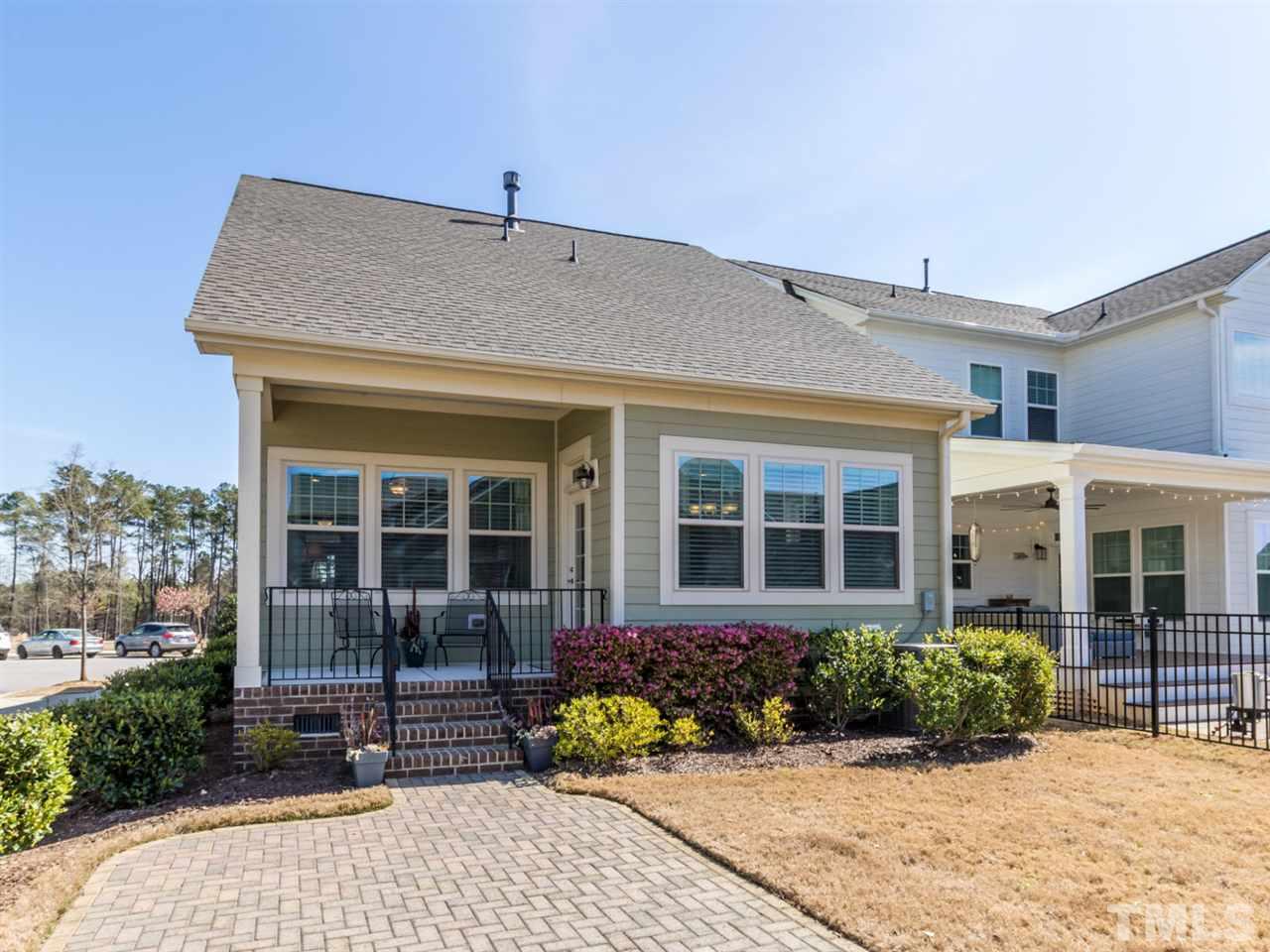 1589 Fullerton Place Raleigh, NC 27607 - Photo 3 of 25 front view of a brick house with a yard