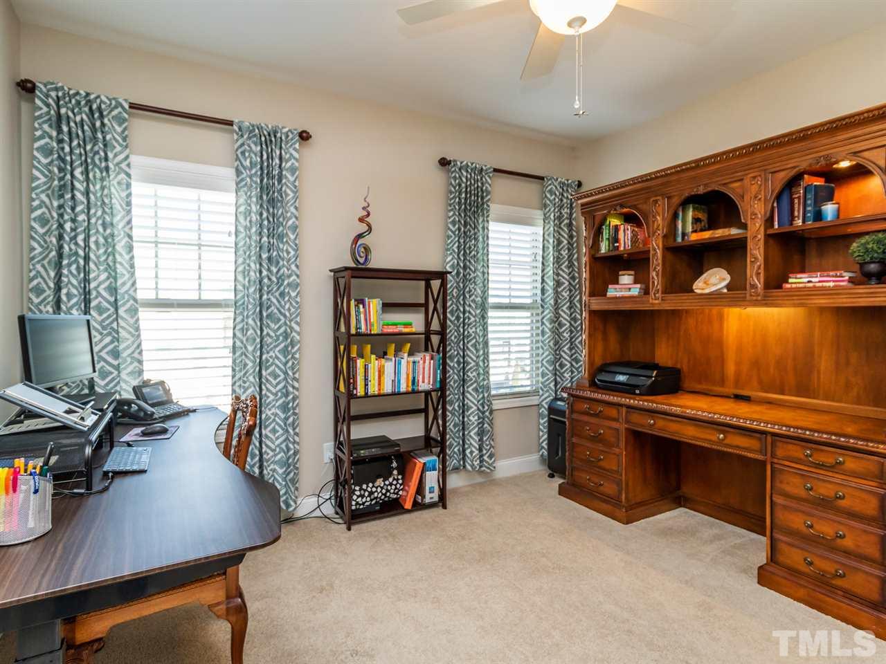 1589 Fullerton Place Raleigh, NC 27607 - Photo 21 of 25 a room with workspace and a window