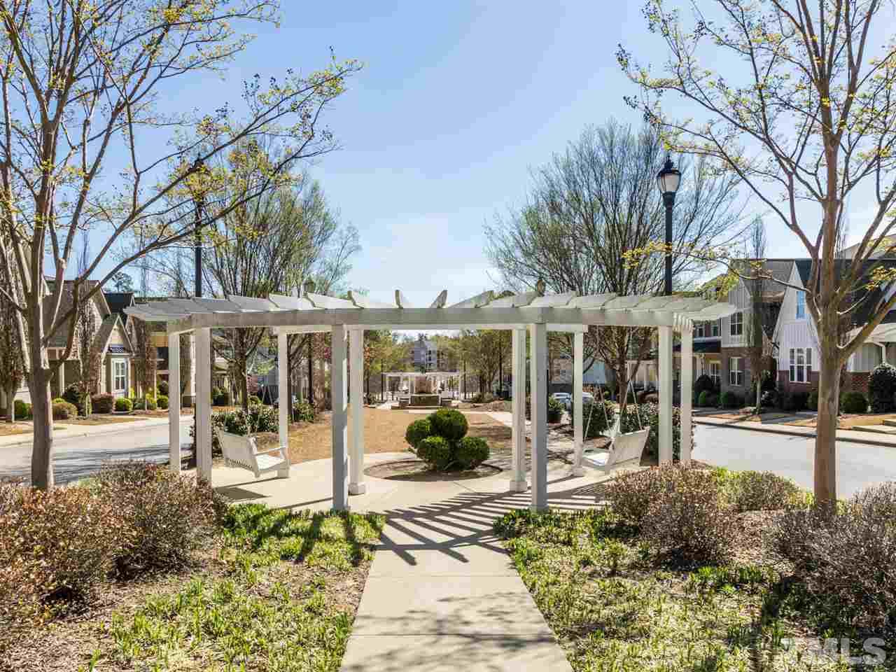 1589 Fullerton Place Raleigh, NC 27607 - Photo 23 of 25 a view of a building with a garden