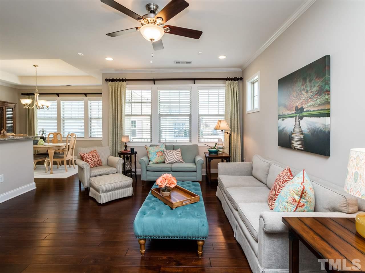 1589 Fullerton Place Raleigh, NC 27607 - Photo 5 of 25 a living room with furniture and a large window