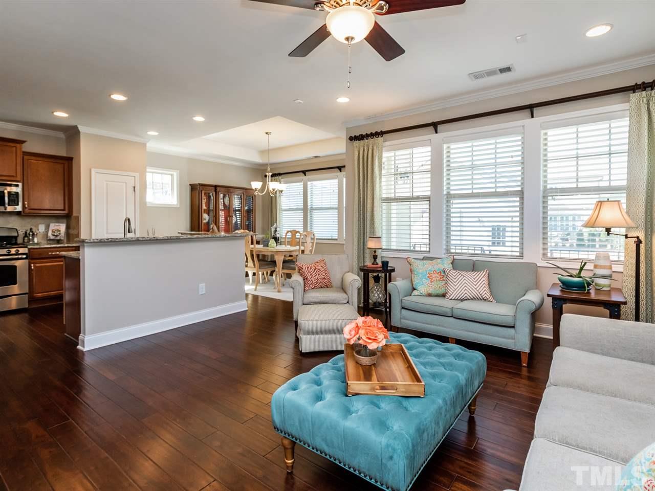 1589 Fullerton Place Raleigh, NC 27607 - Photo 6 of 25 a living room with furniture and a large window