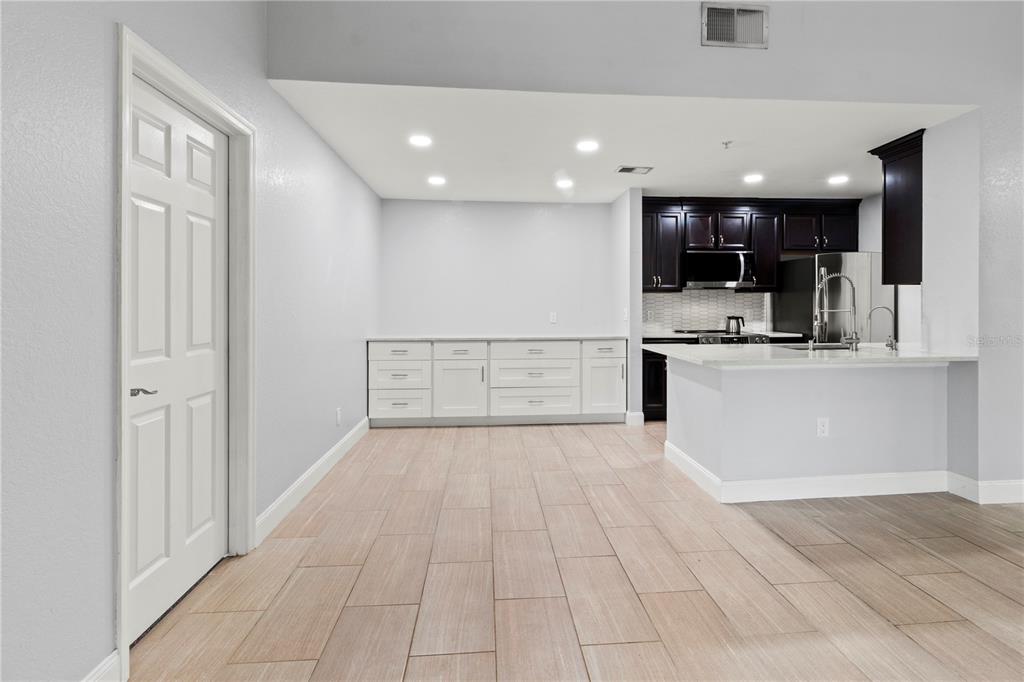 8911 Manor Loop, Unit 204 Lakewood Ranch, FL 34202 - Photo 12 of 45 a view of kitchen with stainless steel appliances a refrigerator and a sink