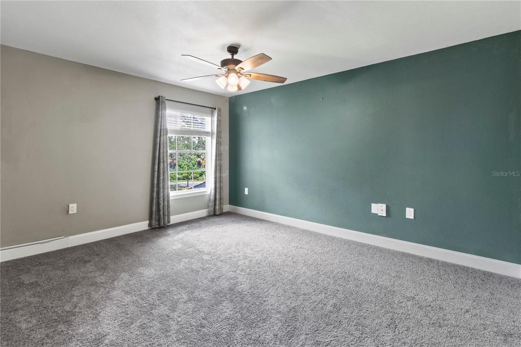 8911 Manor Loop, Unit 204 Lakewood Ranch, FL 34202 - Photo 34 of 45 a view of an empty room with a window