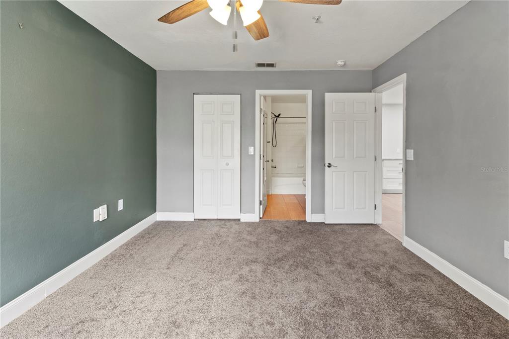 8911 Manor Loop, Unit 204 Lakewood Ranch, FL 34202 - Photo 35 of 45 an empty room with a bathroom