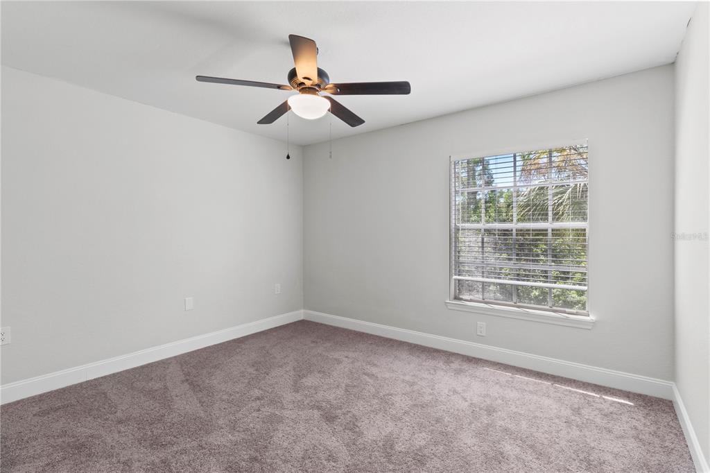 8911 Manor Loop, Unit 204 Lakewood Ranch, FL 34202 - Photo 38 of 45 a view of an empty room with a window